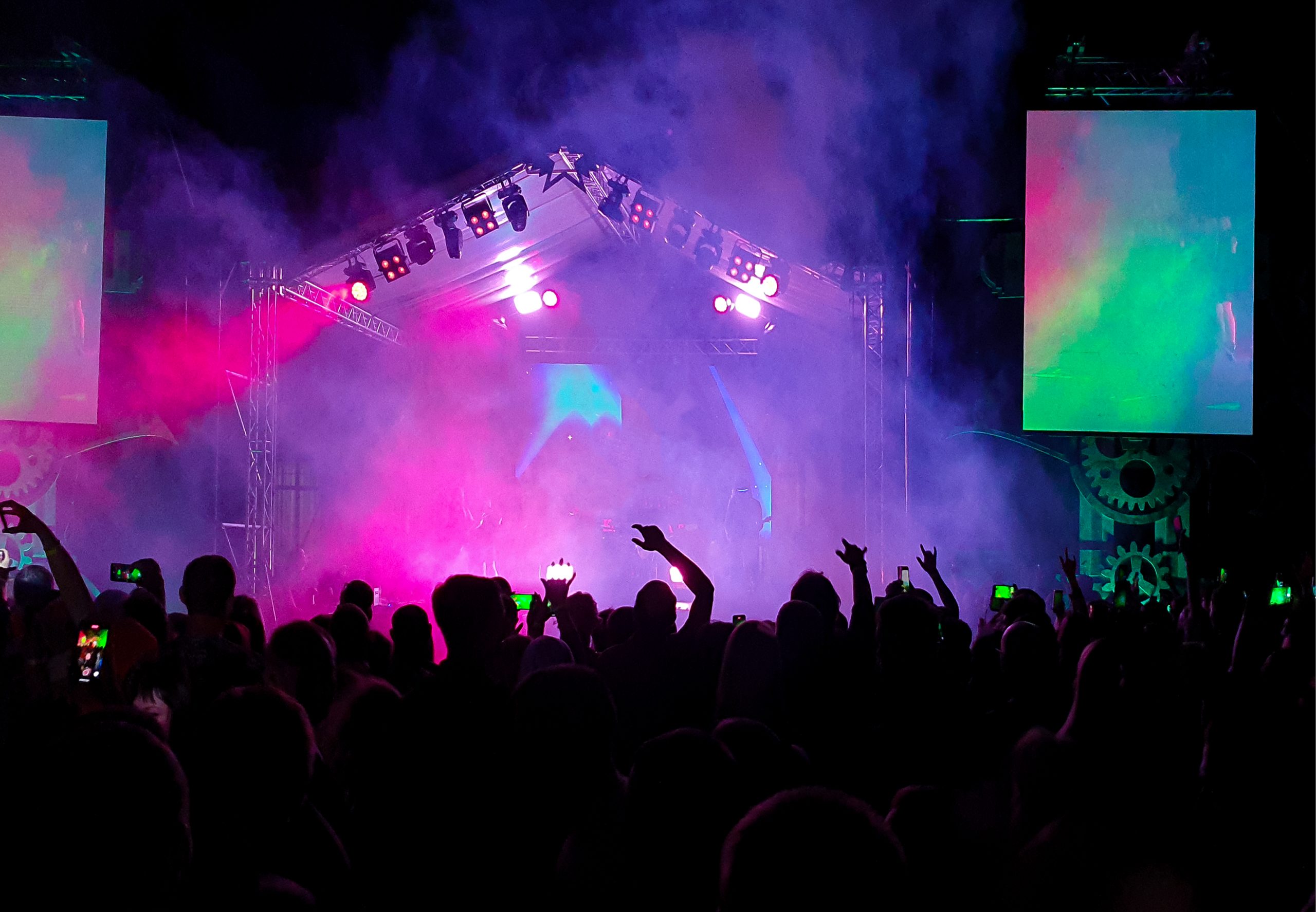 silhouetted-crowd-enjoying-a-nighttime-musical-eve-2026-03-16-00-37-05-utc-scaled-1